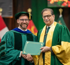 Professor getting an award from the President