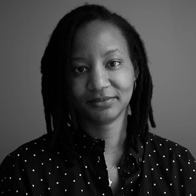 A black and white photo of a woman.