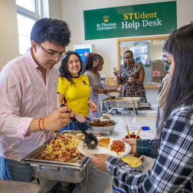 Students serving food