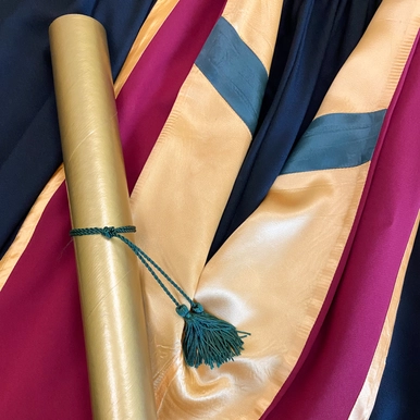 Picture of Black Gown with BA hood and diploma