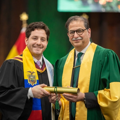 An international student receiving a degree