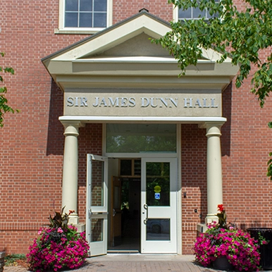 Entrance to James Dunn Hall in the spring