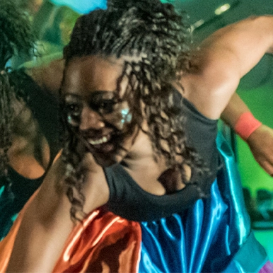 Close up of women dancing on stage