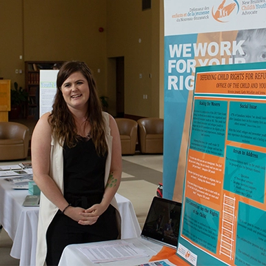 Student presenting at social action fair