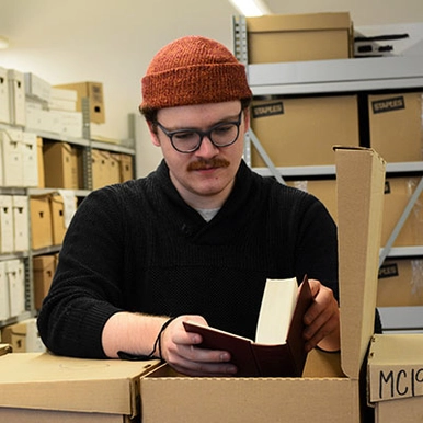 A student looking through a book