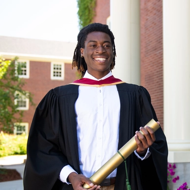 Student holding diploma