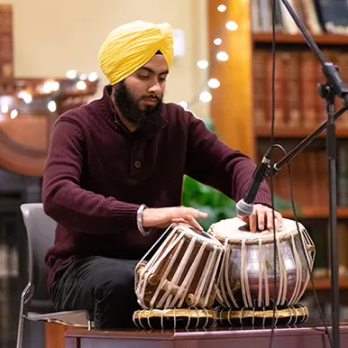 Student playing the drums