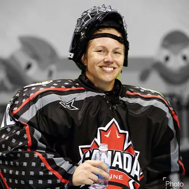 Picture of Kendra Fisher in hockey uniform