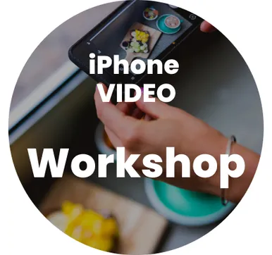 An hand holding a cellphone with the text 