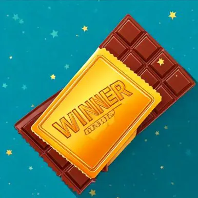A chocolate bar with a golden ticket that says winner