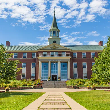 A photo of george martin hall in the summer