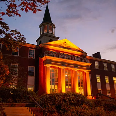 George Martin Hall lit up in orange