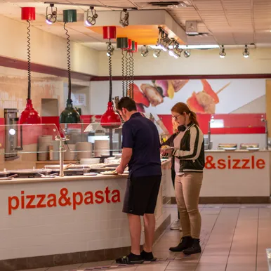 Students getting food at the GMH Dining Hall