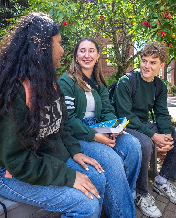 Students sitting in courtyard