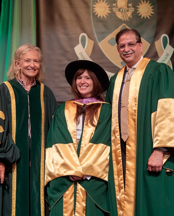 Dr. Farooqi and Chancellor Sandra Irving present Kate Beaton with an Honorary Degree at Summer Convocation