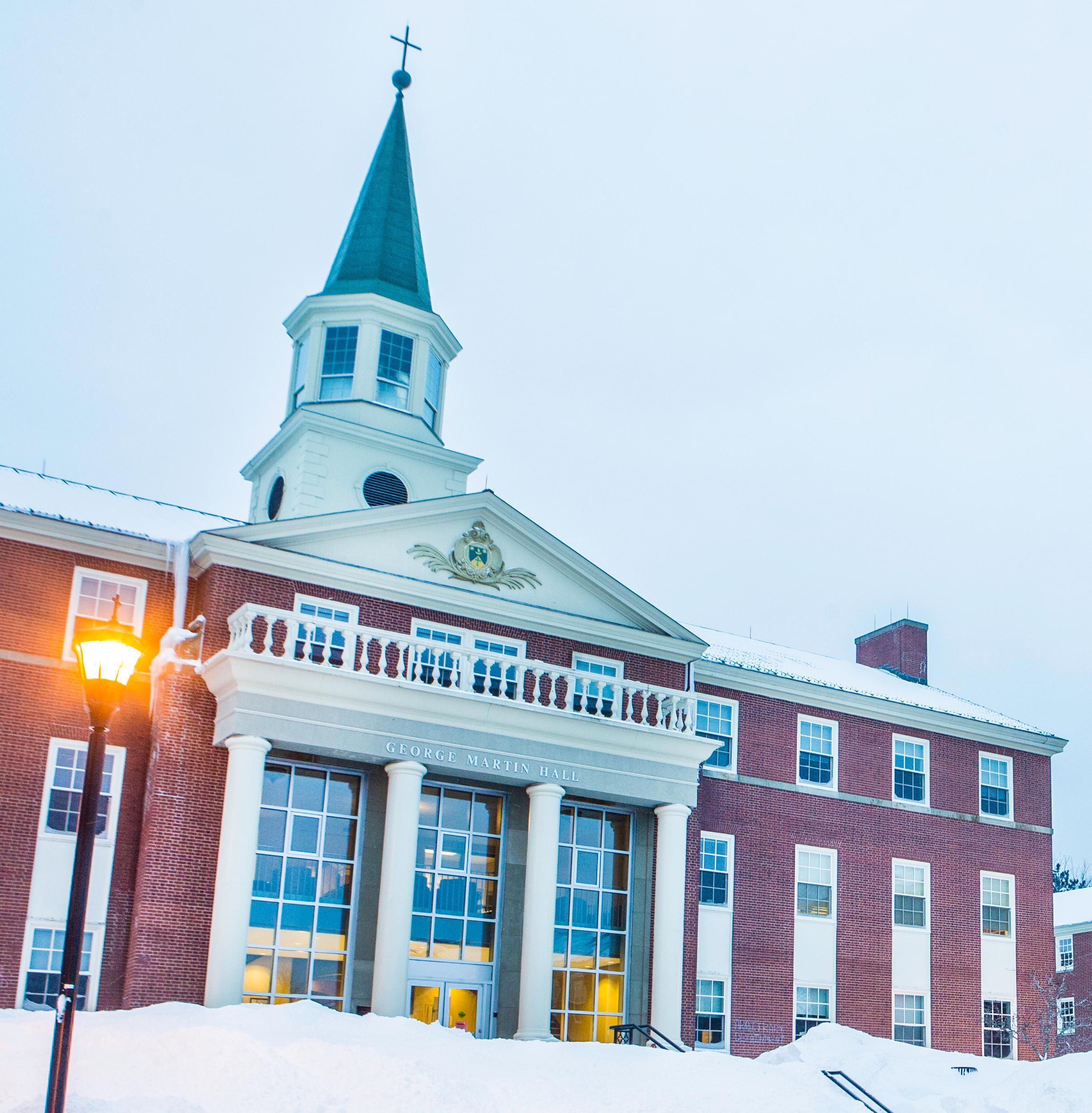 A snowy campus at dusk