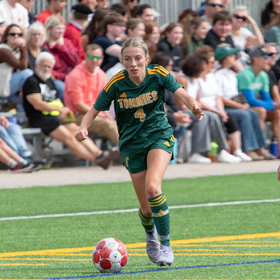 Soccer player kicking ball