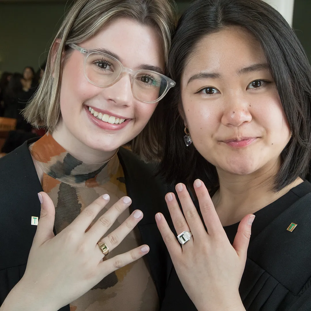 Grads showing off their T-Ring at the T-Ceremony