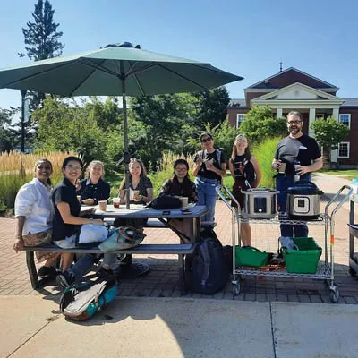 Students in the courtyard during a Hearty STU Lunch