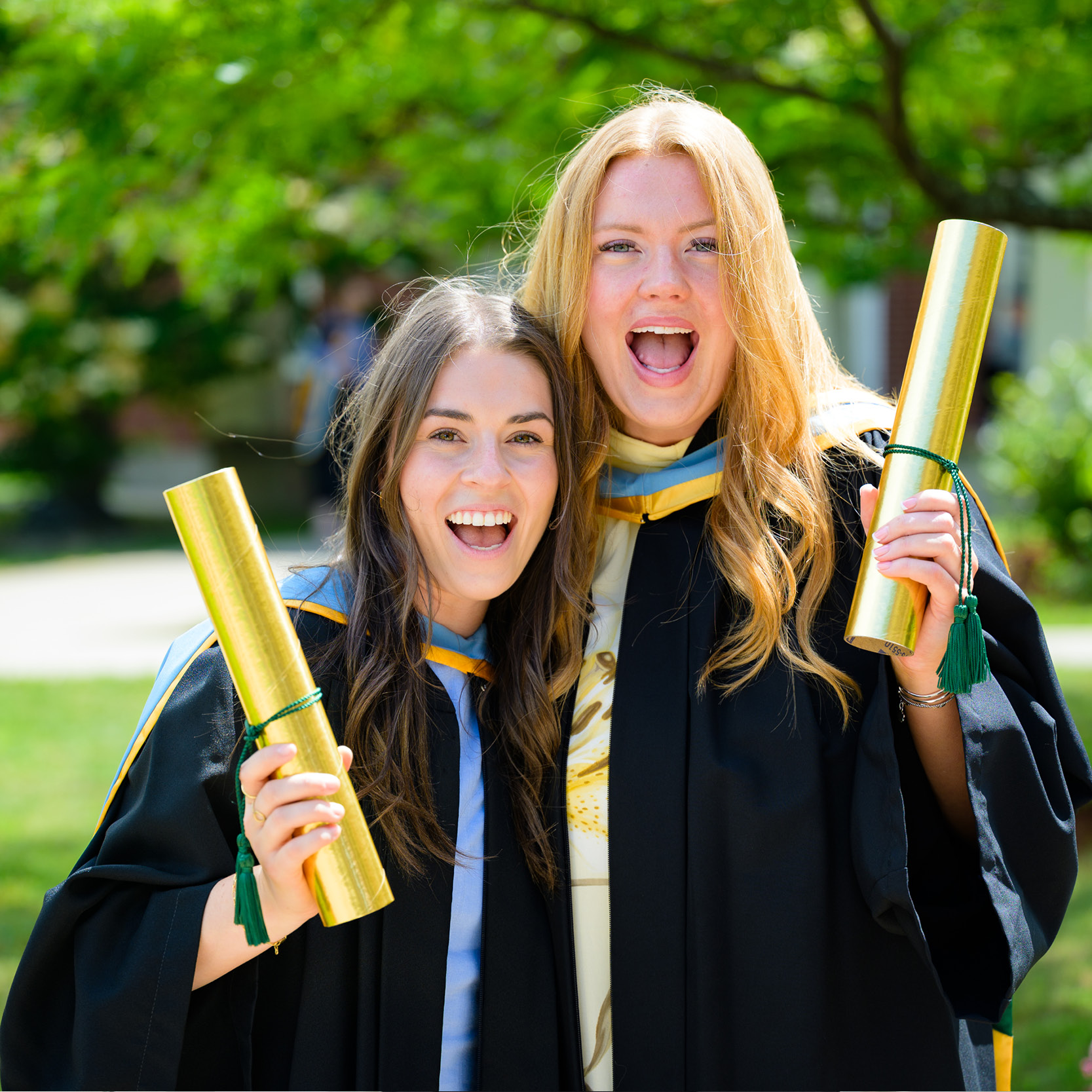 two BEd graduates celebrating convocation