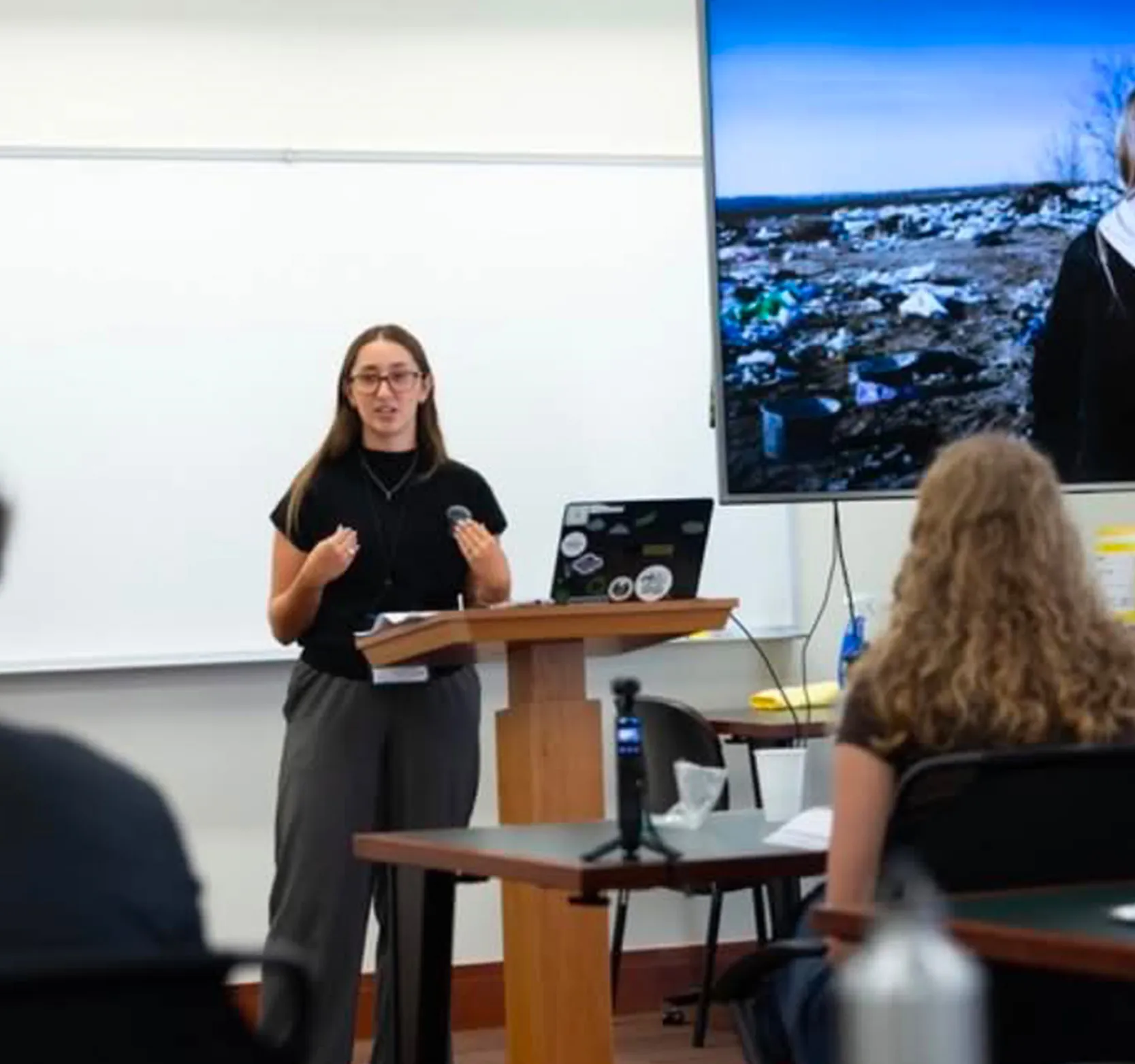 Picture of Kamylle presenting in front of class