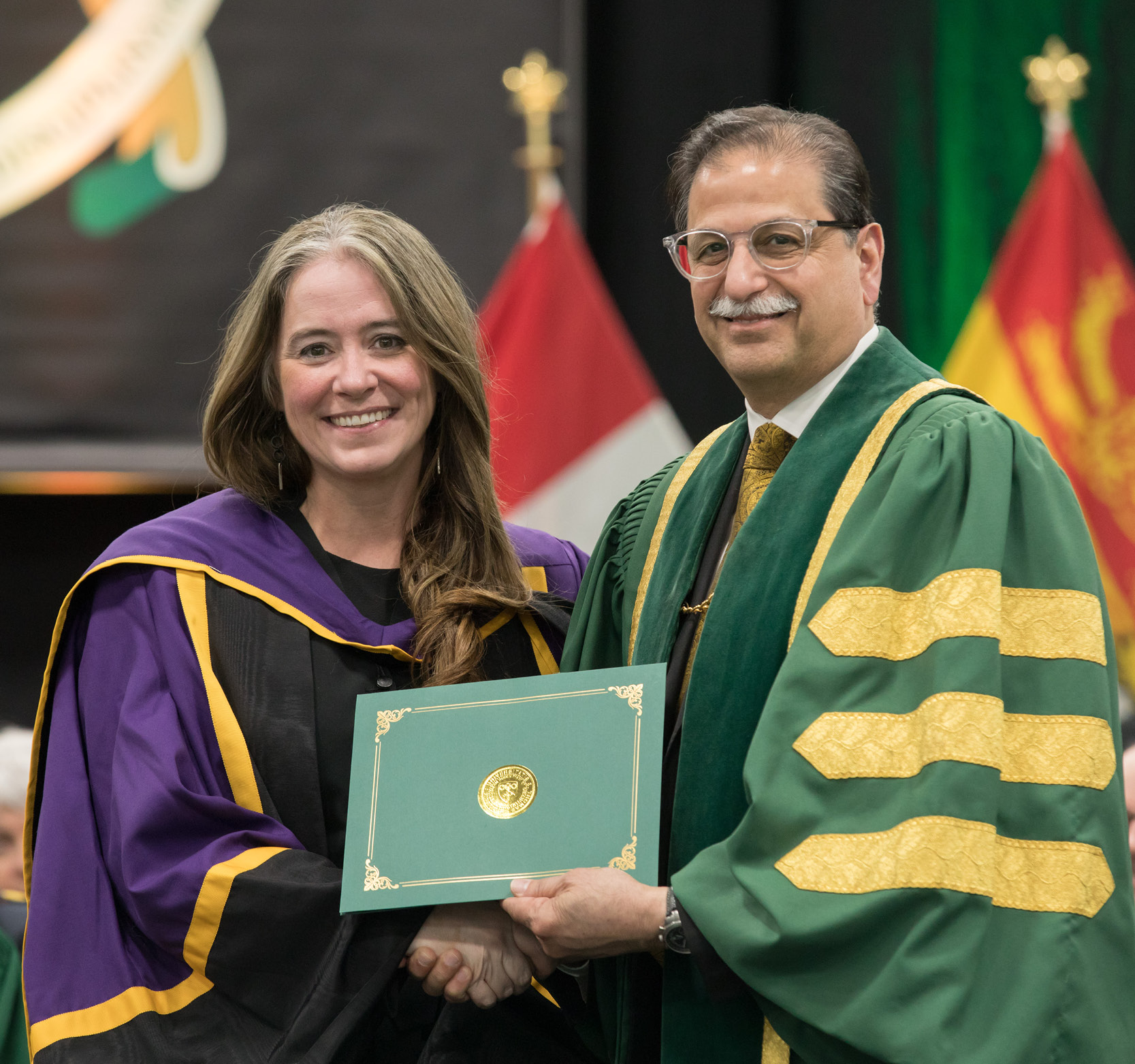 Dr. Karla O'Regan receiving special merit award