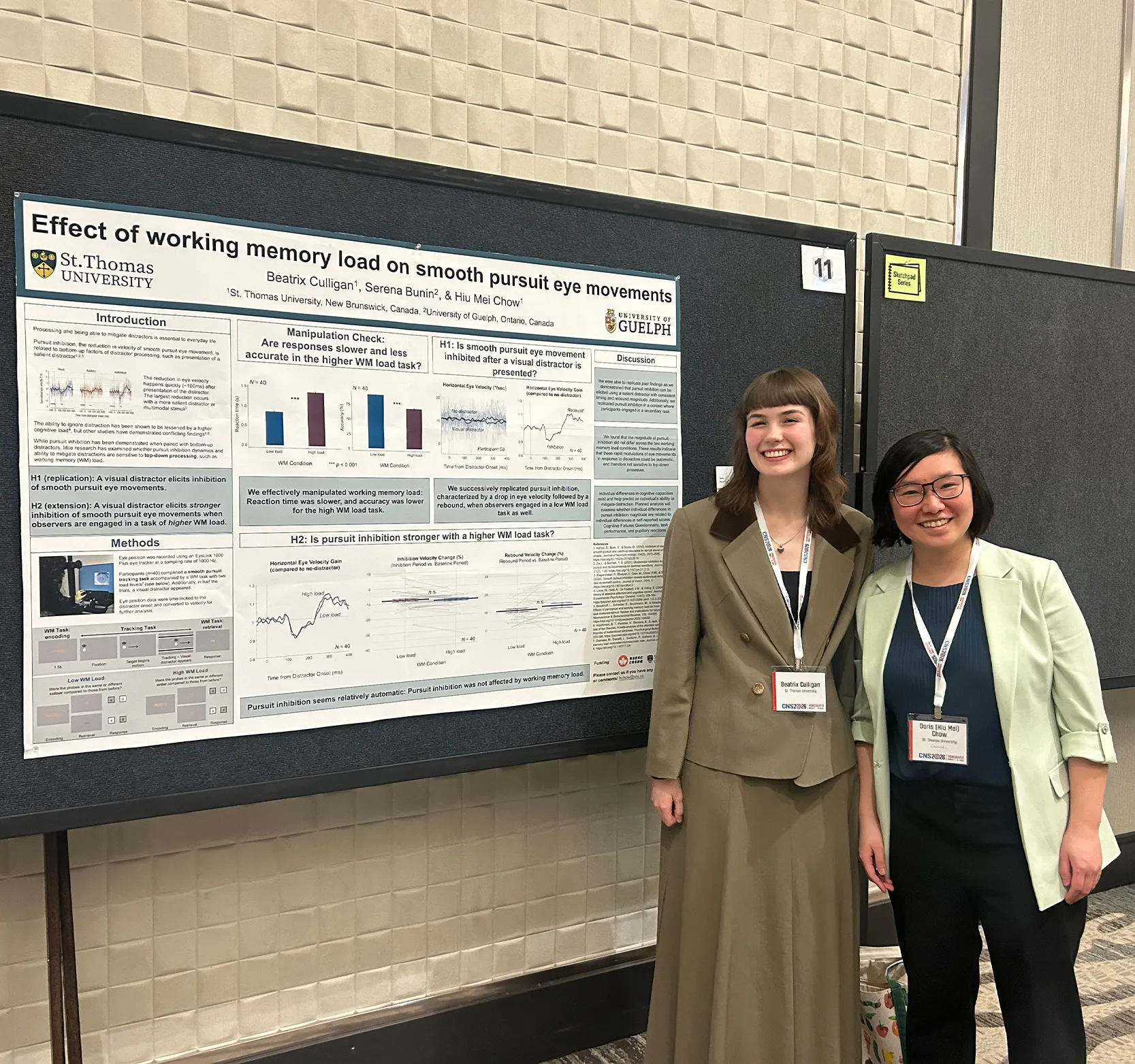 Beatrix and Dr. Chow smiling and standing next to their poster presentation at conference