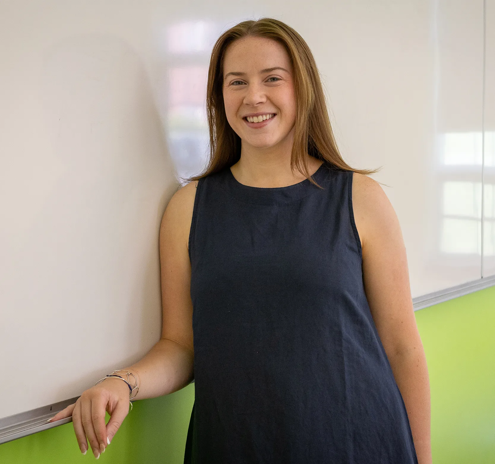 Fiona McMaster, BEd'26, standing at whiteboard in a classroom